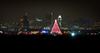 	Zilker Park Trail Of Lights and Christmas Tree against Downtown Skyline - Austin - Texas