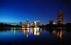 	Downtown Skyline at Night from Lady Bird Lake Boardwalk - Austin - Texas